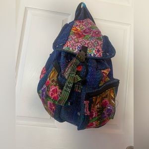 Backpack with hand embroidered Guatemalan huipil.